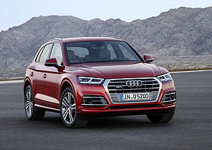 red Audi crossover SUV