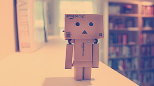 box man on white table HD wallpaper