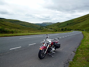 red and silver cruiser motorcycle on hi-way photo, brecon beacons