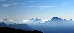 clouds at mountain peak HD wallpaper
