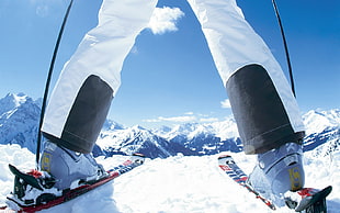 person on ski blade on glacier mountains HD wallpaper