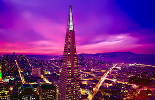 photo of illuminated high rise tower