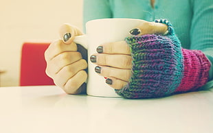 woman holding mug with both hands HD wallpaper
