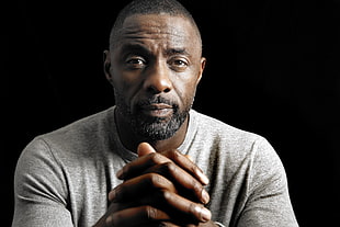 man wearing gray crew-neck t-shirt
