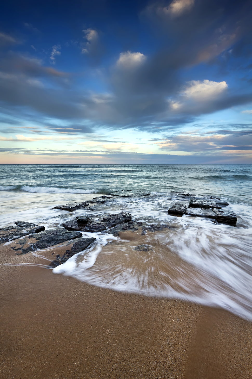 tidal wave heating sand beach during day HD wallpaper
