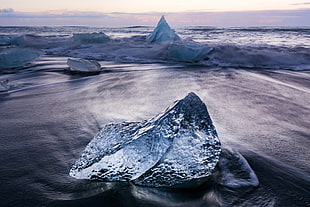 ice bergs on bodies of water during daytime HD wallpaper
