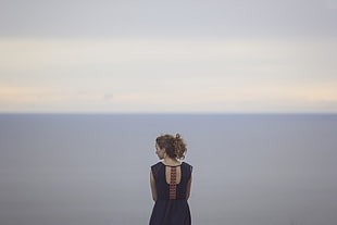 woman standing near sea