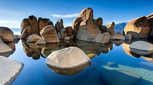 beige rock formations on still water, rock, landscape, nature, water