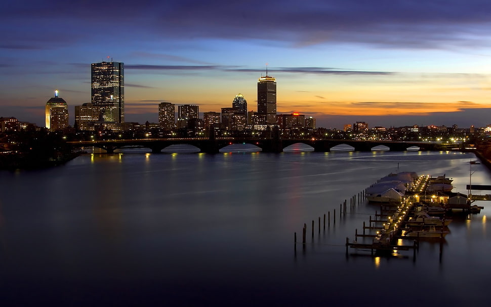 skyline photograph of city during sunrise HD wallpaper