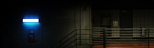 gray steel fence, multiple display, building, door, lights