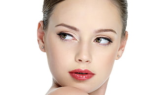 woman in red lipstick and Diamond stud earrings