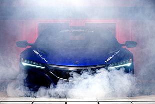 blue luxury car with white smoke