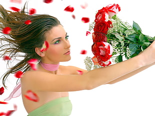 woman holding rose bouquet