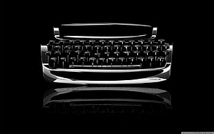 silver and black typewriter, typewriters