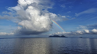 white clouds and rainbow, nature, sea