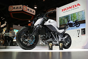 photo of white Honda naked motorcycle