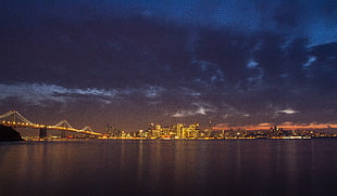 photography of body of water near city buildings during nigh time, san francisco HD wallpaper