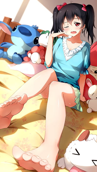 girl anime wearing blue top lying on yellow bed