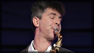 man playing saxophone HD wallpaper