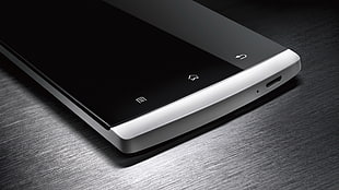 silver Android smartphone on black surface HD wallpaper