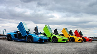 four assorted-color sports cr
