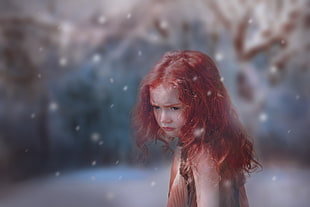 macro photography of red hair girl