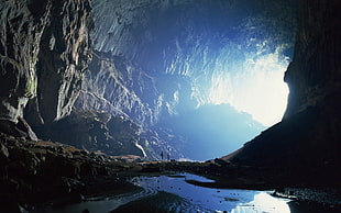 brown cave, cave, rock, cliff, water