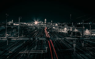 time lapse photo of bridge and road, Limoges, France, train station, light trails
