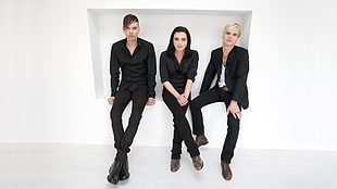 three person sitting wearing blacks HD wallpaper
