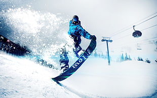 man riding on blue snowboard