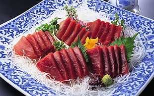 red meat dish with plate