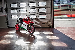 white and red Ducati sports bike HD wallpaper