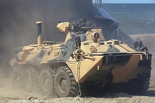 brown and black camouflage battle tank