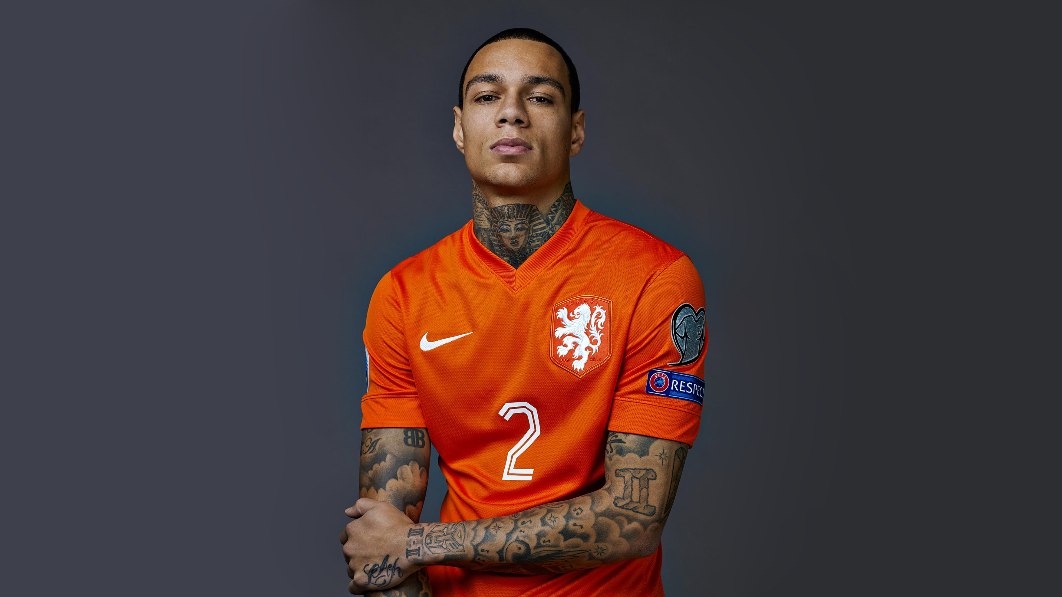 men's orange Nike soccer jersey shirt, footballers, players, tattoo, simple background