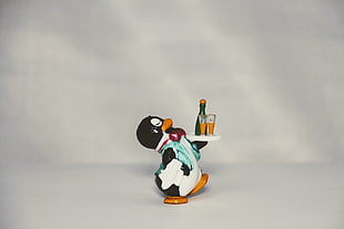 bartender penguin figurine