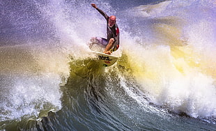 man surfing photo