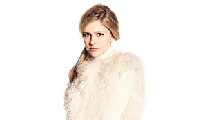 woman wearing white fur line long-sleeved top against white background \