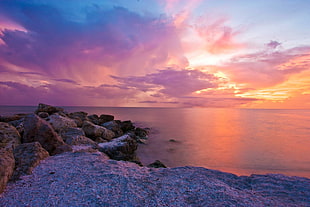 rocks across horizon during dawn HD wallpaper