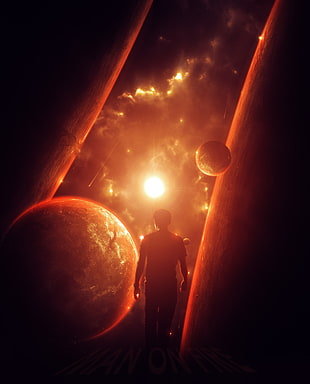 silhouette of man standing on galaxy
