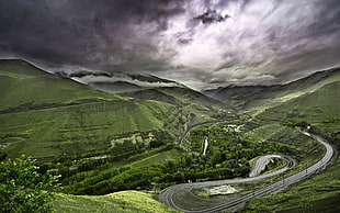gray road near mountain