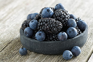 blueberries on gray pot