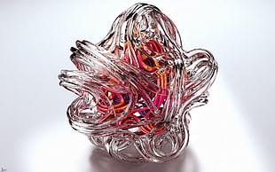 closeup photo of clear and red glass decor