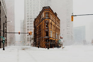 brown concrete building, snow, USA, street, winter