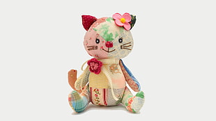 multicolored patchwork cat plush toy