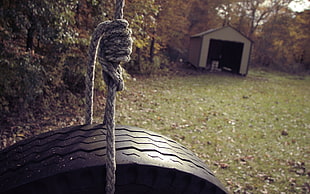 vehicle tire near storage shed at daytime HD wallpaper