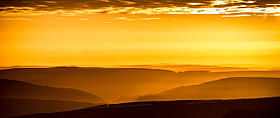 brown desert during sunset