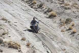 man riding on black touring motorcycle HD wallpaper