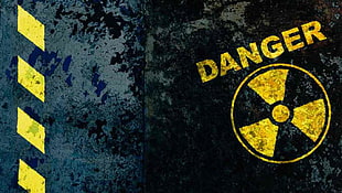 micro photography of danger signage HD wallpaper