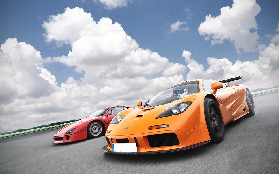 two red and orange sports cars HD wallpaper