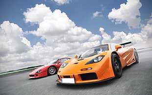 two red and orange sports cars